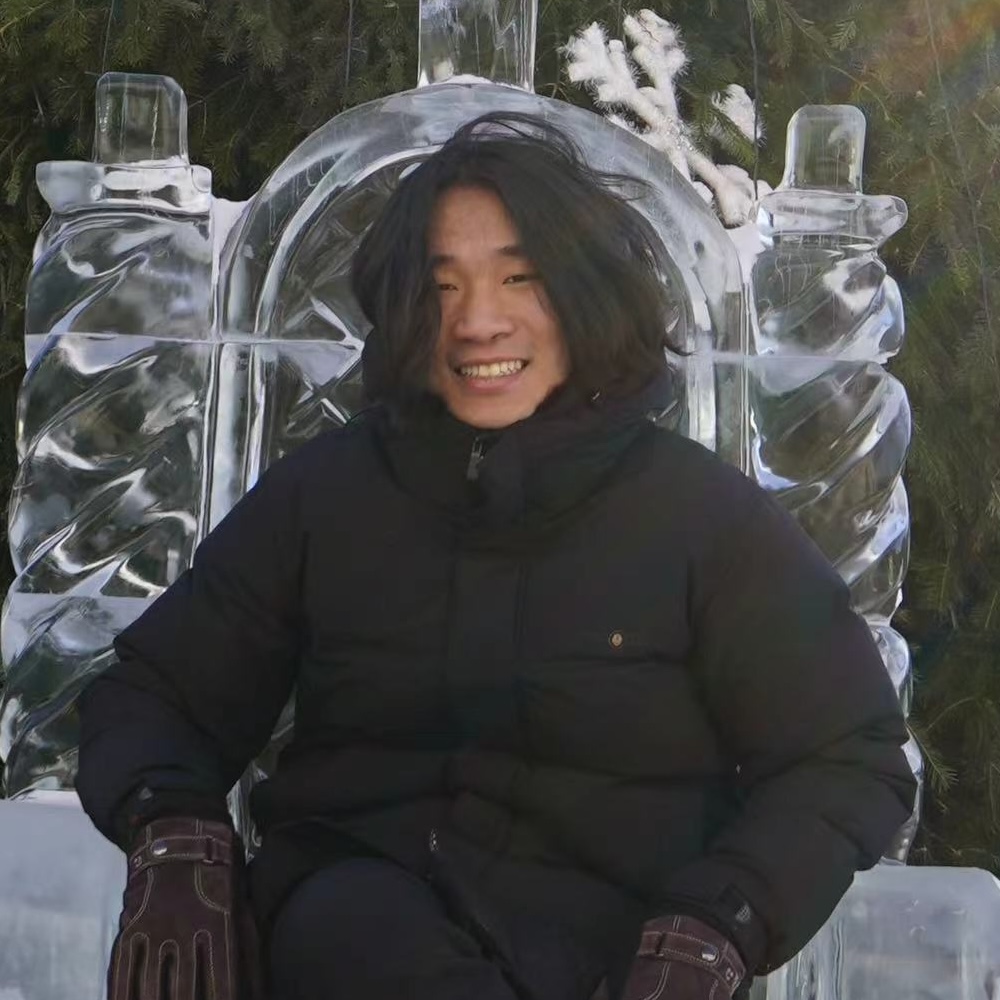 I am Tingyu. I am wearing a black down jacket.